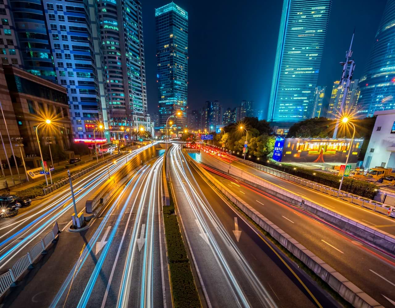 night time street view of road markings