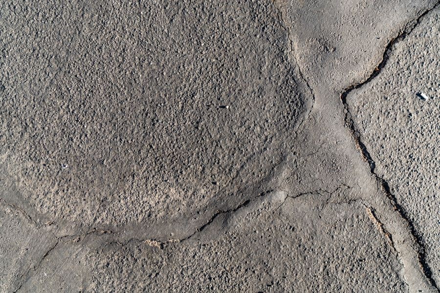 cracked pavement road problem