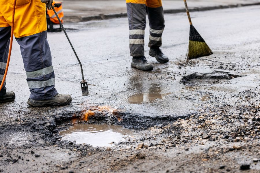 fixing potholes on roads