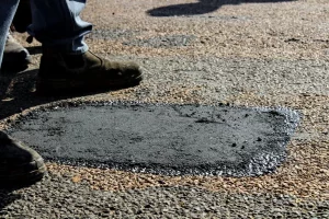 patched hole on a road