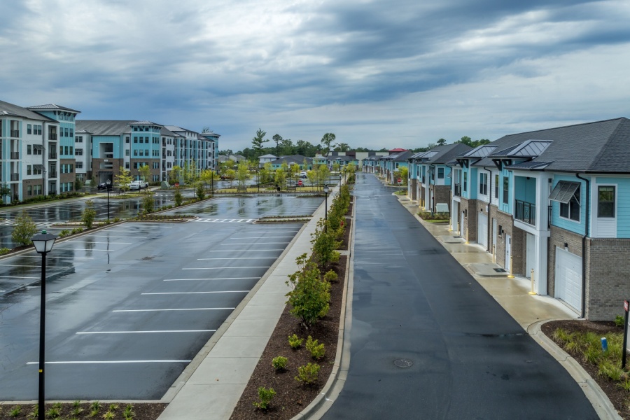 a real estate village with a wide road